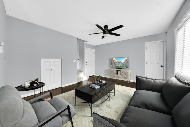 living room with ceiling fan, a healthy amount of sunlight, and hardwood / wood-style flooring