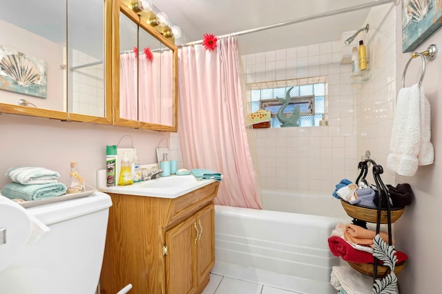 bathroom with tile patterned flooring, vanity, and shower / tub combo with curtain