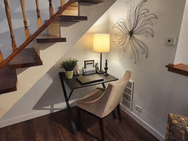 home office with hardwood / wood-style flooring