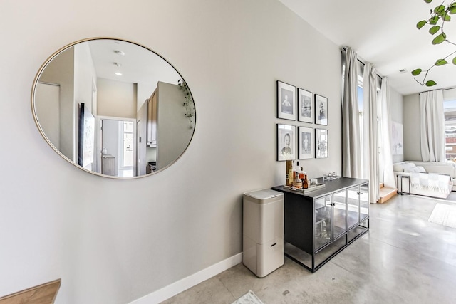 949 W Madison St Unit 601B, Chicago, IL 60607 - hallway with baseboards and finished concrete flooring