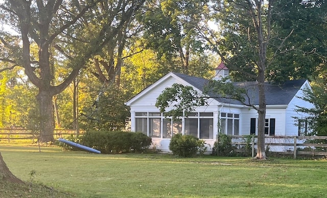 exterior space featuring a lawn