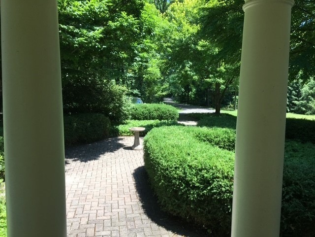 view of property's community featuring a patio area