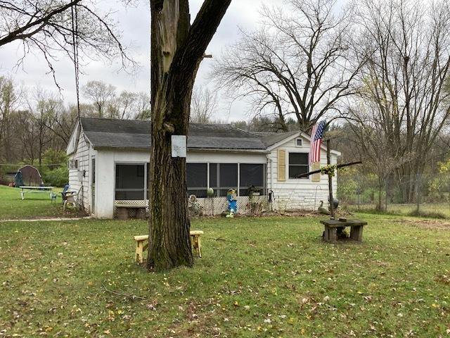 exterior space with a lawn