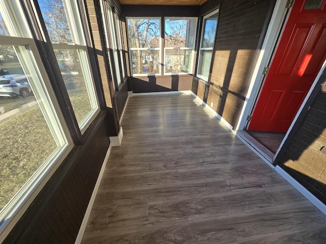 unfurnished sunroom with a healthy amount of sunlight