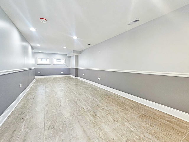 unfurnished room with light hardwood / wood-style floors