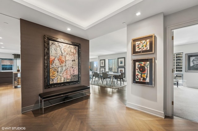 hallway with parquet flooring