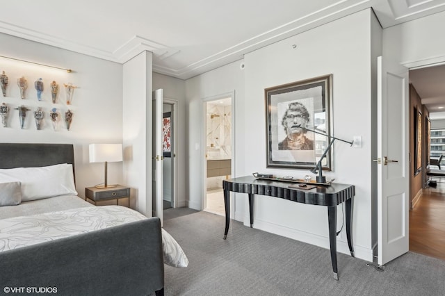 bedroom featuring connected bathroom and parquet flooring