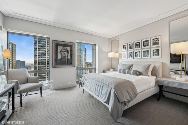 bedroom featuring carpet flooring and crown molding