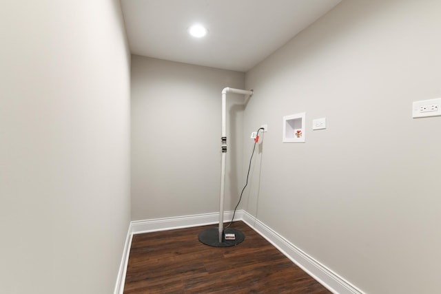 laundry area featuring dark hardwood / wood-style flooring and hookup for a washing machine