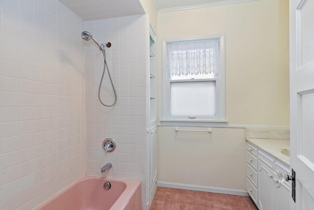 bathroom with vanity, tile patterned floors, and tiled shower / bath