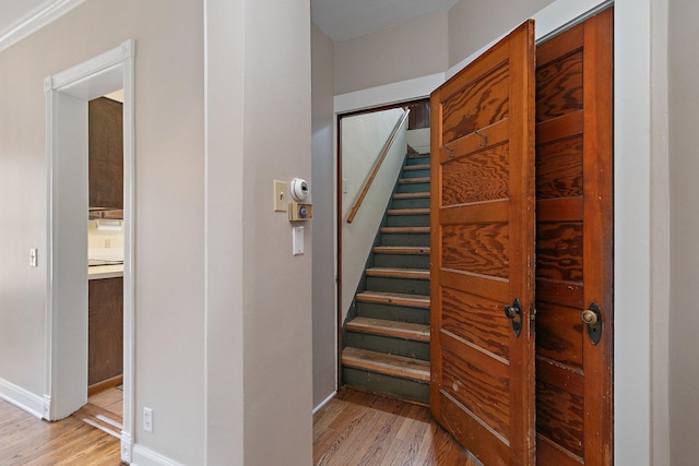 hall with light wood-type flooring