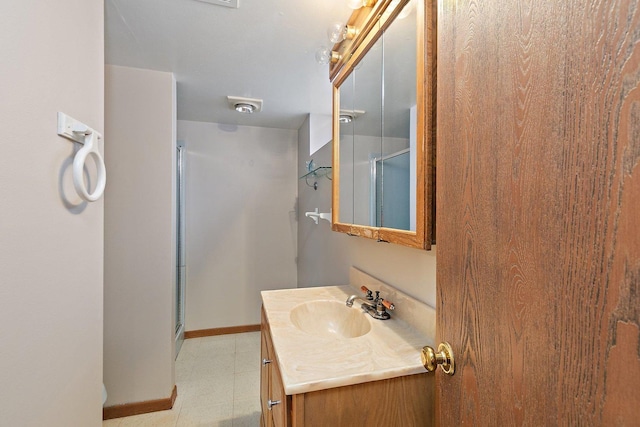 bathroom featuring vanity and walk in shower