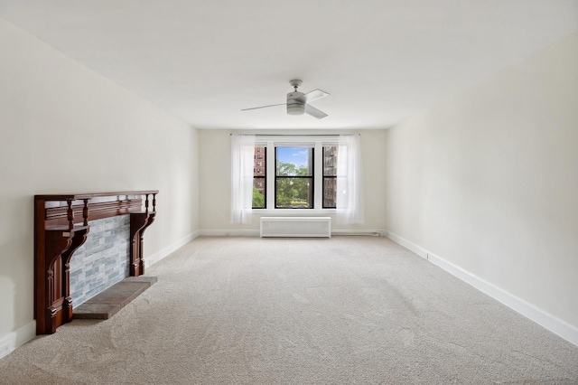 living room with ceiling fan and light colored carpet