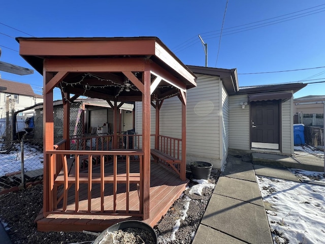 wooden terrace with a gazebo