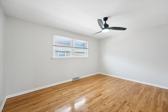 unfurnished room featuring ceiling fan and light hardwood / wood-style floors