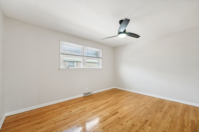 unfurnished room featuring ceiling fan and light hardwood / wood-style flooring