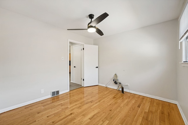 unfurnished room featuring light hardwood / wood-style floors and ceiling fan