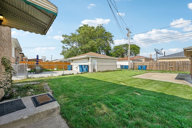 view of yard featuring a patio area and an outdoor structure