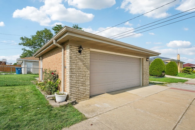 view of property exterior featuring a garage and a yard