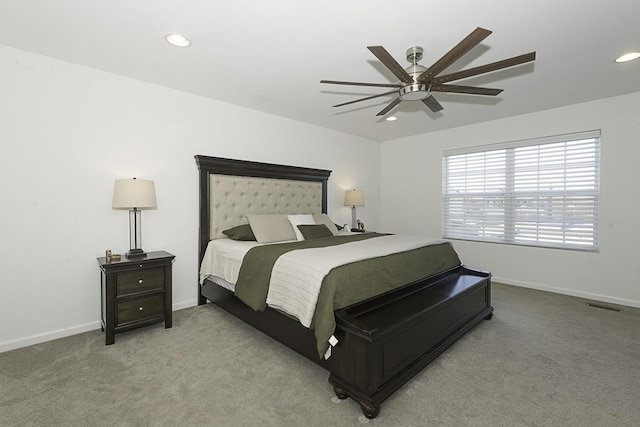 carpeted bedroom with ceiling fan