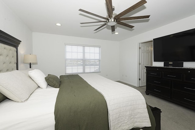 carpeted bedroom with ceiling fan