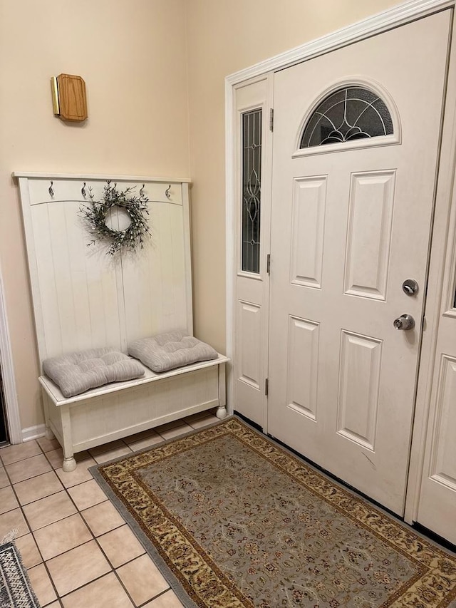 mudroom with light tile patterned floors