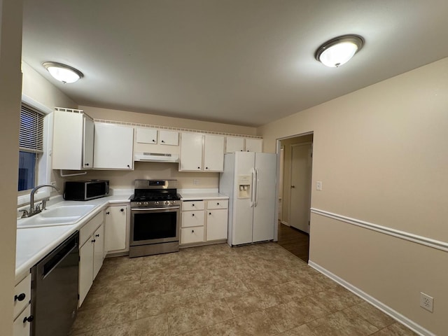 kitchen featuring sink, white cabinetry, and appliances with stainless steel finishes