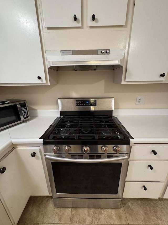 kitchen featuring white cabinetry and stainless steel appliances