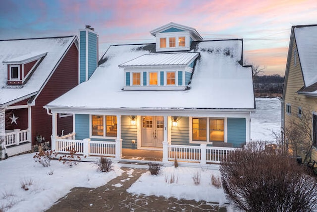 view of front of property featuring covered porch