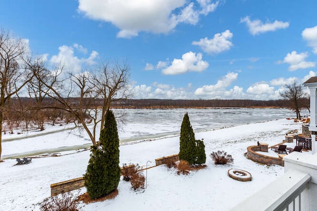 view of yard covered in snow