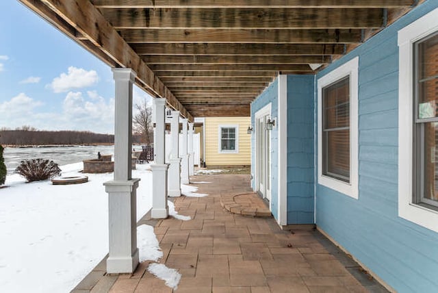 view of snow covered patio