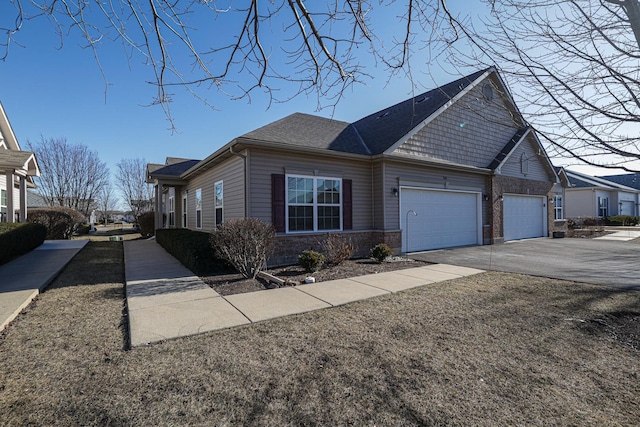 view of side of property with a garage