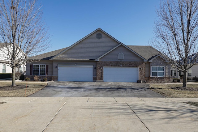 single story home with a garage