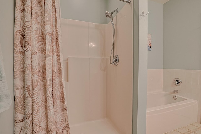 bathroom with independent shower and bath