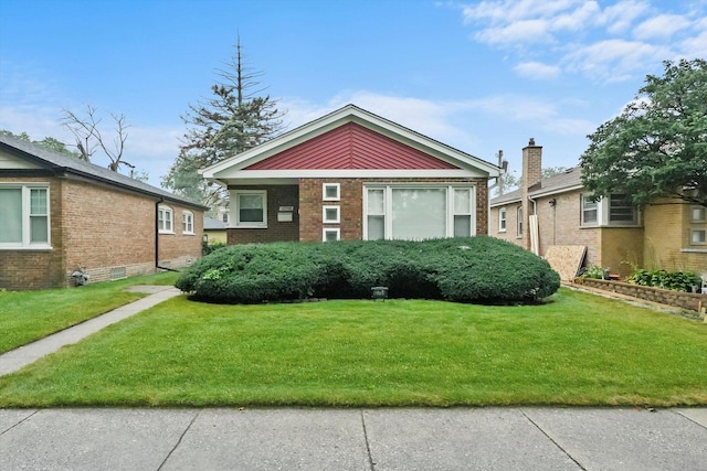 view of front of property with a front yard