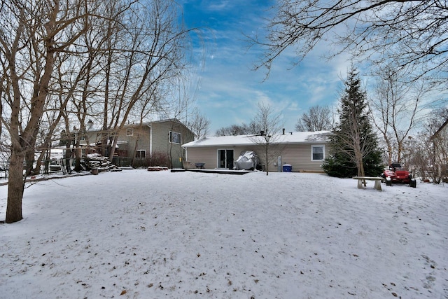 view of snow covered property