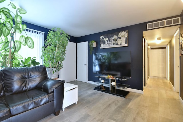 living room featuring light hardwood / wood-style flooring