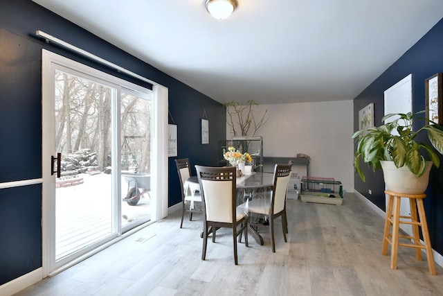 dining area featuring light hardwood / wood-style floors