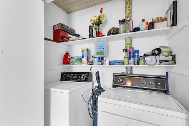 laundry room featuring separate washer and dryer