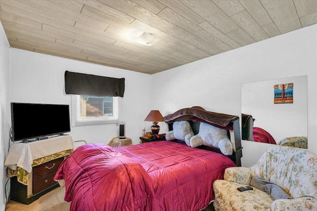 bedroom with light carpet and wooden ceiling