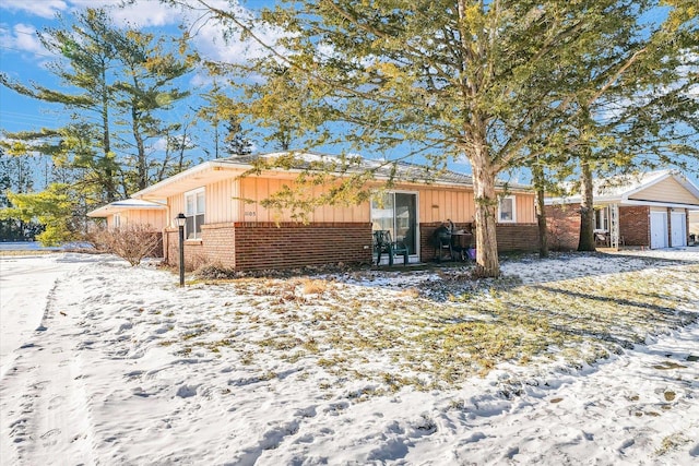 view of snow covered house