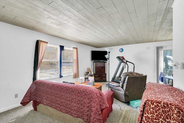 bedroom featuring light carpet and wood ceiling