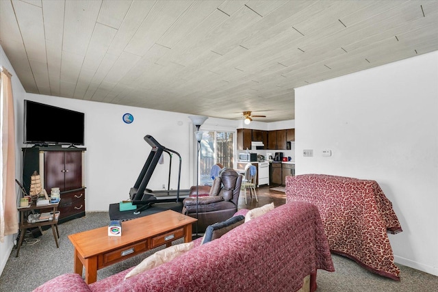 living room featuring wood ceiling, ceiling fan, and carpet flooring