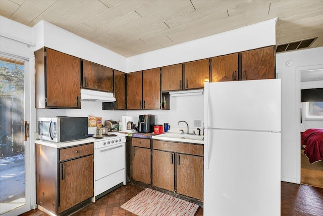 kitchen with sink, white appliances, and wooden ceiling