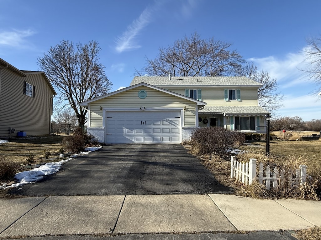 view of front of home with a garage