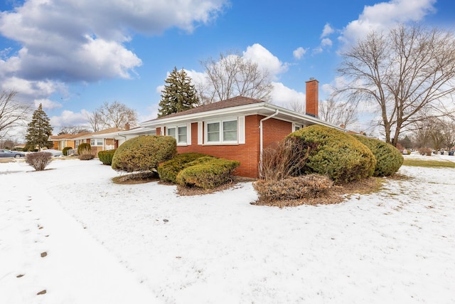 view of snow covered property