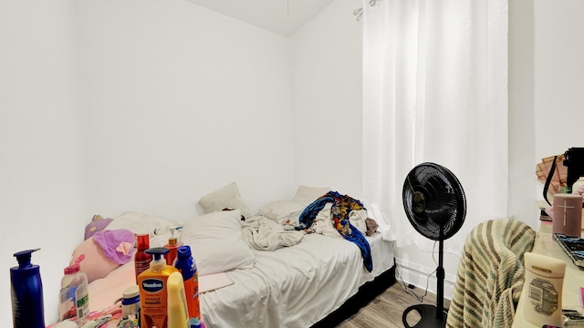 bedroom featuring hardwood / wood-style floors