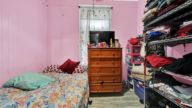 bedroom featuring wood-type flooring