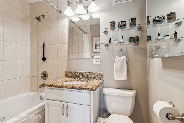 full bathroom featuring toilet, vanity, and shower / bath combo