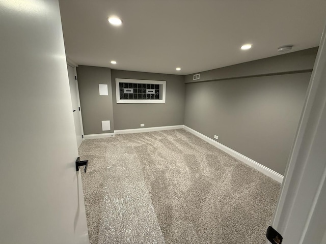 basement with carpet flooring